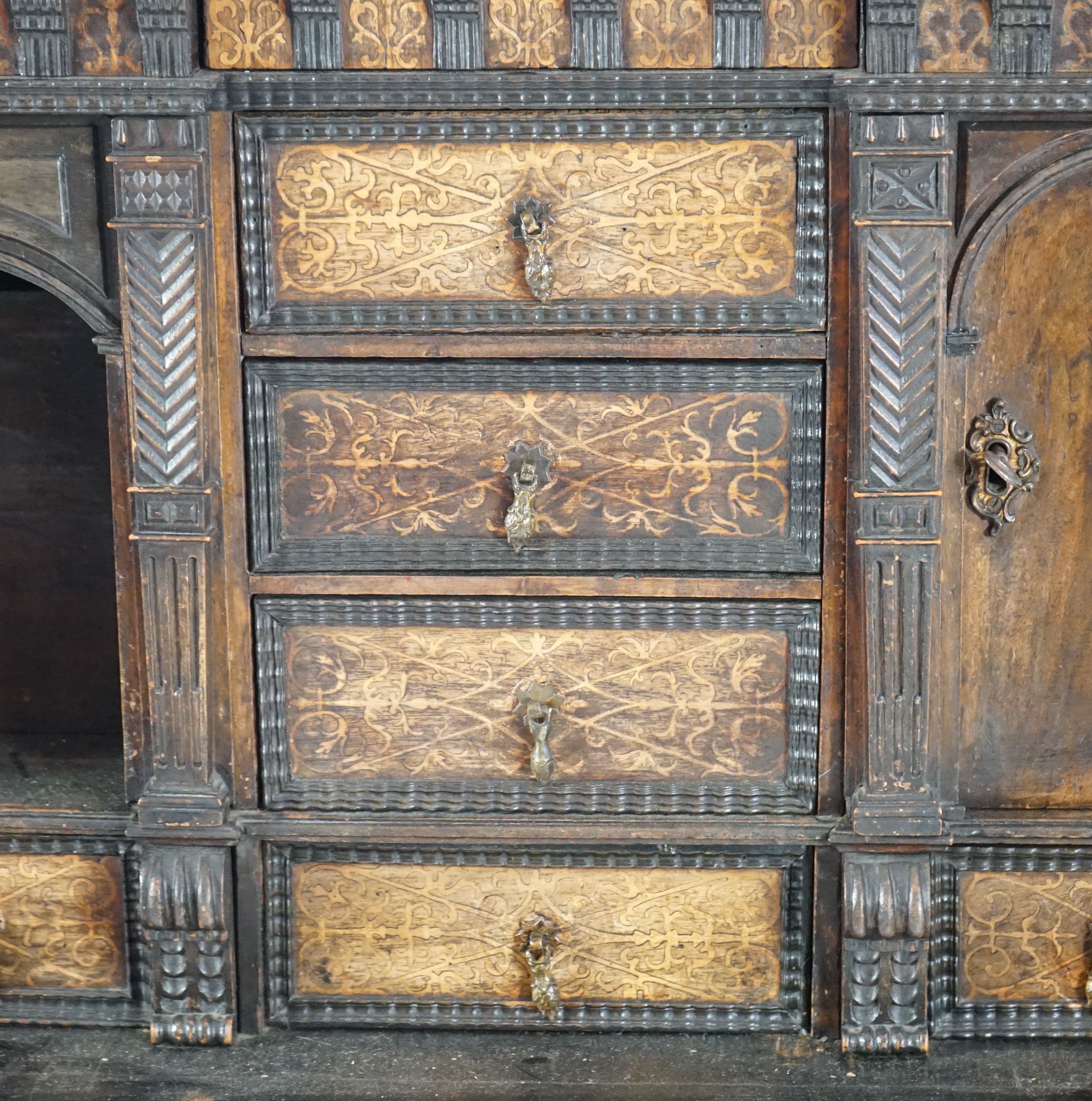 An 18th century and later Dutch walnut ebonised and marquetry inlaid collector's cabinet on stand